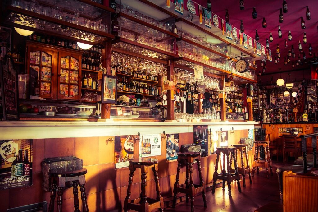 Image of a bar with empty stools.